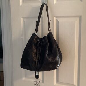 CHANEL Black Leather Drawstring Bag